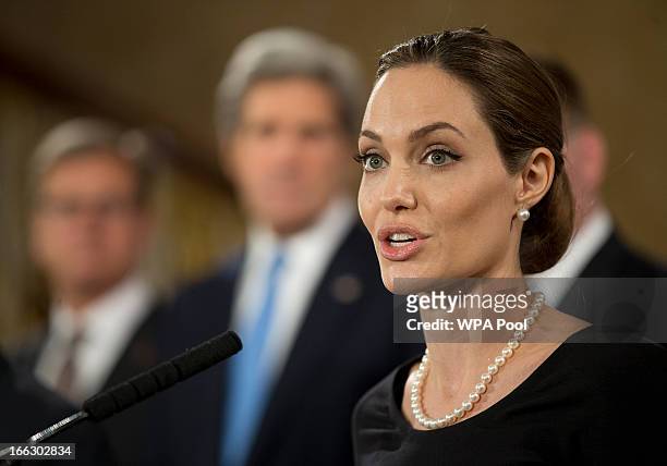 Actress Angelina Jolie, in her role as UN envoy, talks during a news conference regarding sexual violence against women in conflict, at the Foreign...