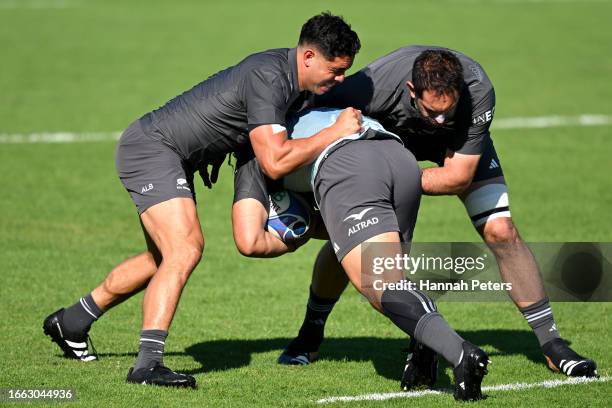 Anton Lienert-Brown and Sam Whitelock of the All Blacks warm up during a New Zealand All Blacks training session on September 06, 2023 in Lyon,...