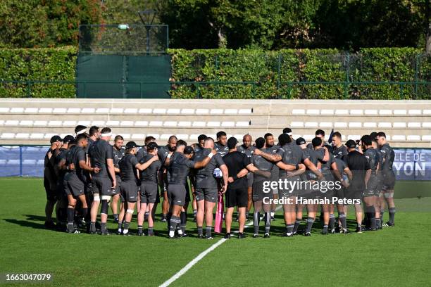The All Blacks huddle during a New Zealand All Blacks training session on September 06, 2023 in Lyon, France.