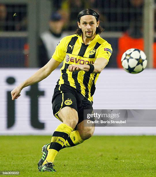 Neven Subotic of Dortmund runs with the ball during the UEFA Champions League quarter-final second leg match between Borussia Dortmund and Malaga at...