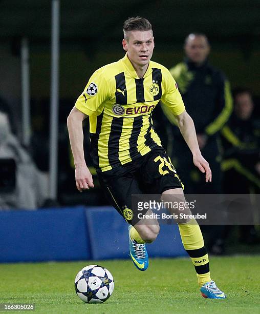 Lukasz Piszczek of Dortmund runs with the ball during the UEFA Champions League quarter-final second leg match between Borussia Dortmund and Malaga...