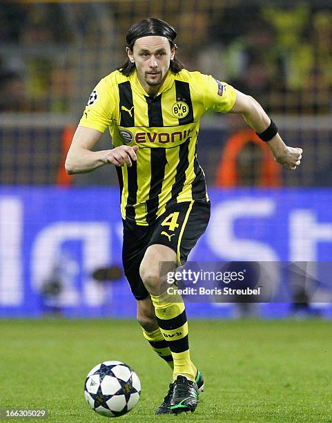 Neven Subotic of Dortmund runs with the ball during the UEFA Champions League quarter-final second leg match between Borussia Dortmund and Malaga at...