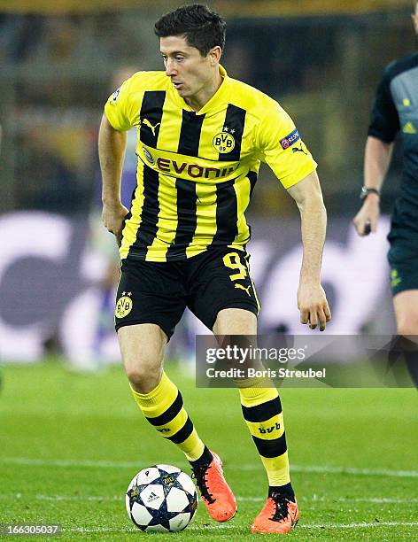 Robert Lewandowski of Dortmund runs with the ball during the UEFA Champions League quarter-final second leg match between Borussia Dortmund and...