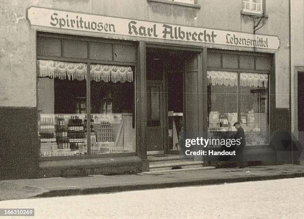 This handout image dated 1930 provided by ALDI Einkauf GmbH & Co. OHG shows an general outside view of Karl Albrecht Spiritousen and Lebensmittel...