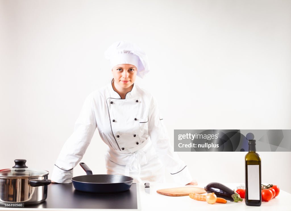 Chef cooking in her kitchen