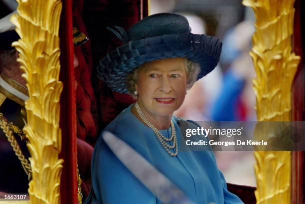 Britain's Queen Elizabeth rides in the Golden State Carriage at the head of a parade from Buckingham Palace to St Paul's Cathedral celebrating the...