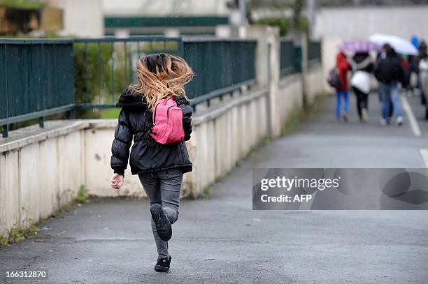 Girl leaves after class on April 11, 2013 the Rene Couzinet college where an eleven years old girl was kidnapped after school and released a few...