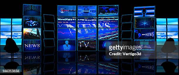 multiple tv screens display news in a dark studio - projection screen stock pictures, royalty-free photos & images