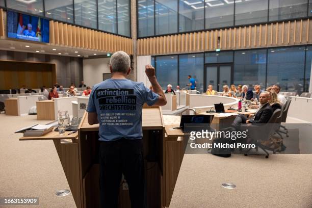 Extinction Rebellion 'Drechtsteden' activist David Klein addresses the provincial government during a hearing about the consequences of pollution...