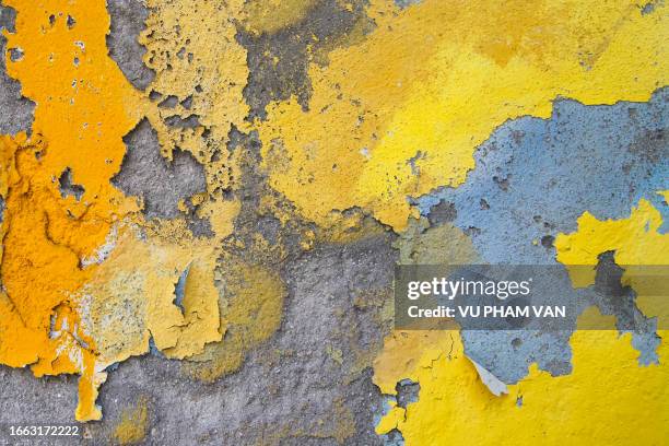 weathered wall with multi-layered paint in penang, malaysia - torn map stock pictures, royalty-free photos & images