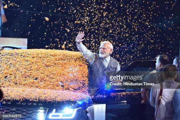 Prime Minister Narendra Modi being welcomed at BJP HQ after following the successful G20 meeting under India's presidency, as he arrived there to...