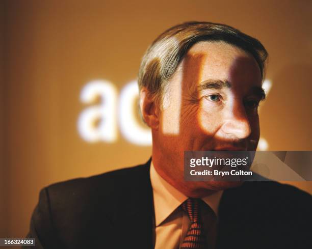 Sir Vernon Ellis, international chairman of Accenture Plc , sits in the boardroom and poses for a photograph at the company's headquarters in the...