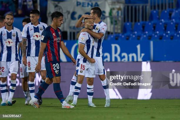 Enric Franquesa of CD Leganes celebrates after scoring his team's second goal with team mates during the LaLiga Hypermotion match between CD Leganes...