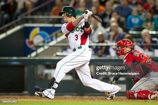 Jorge Cantu of Mexico bats against Canada during the World Baseball Classic First Round Group D game on March 9, 2013 at Chase Field in Phoenix,...