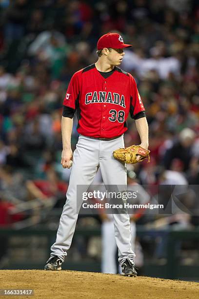 Trystan Magnuson of Canada pitches against Mexico during the World Baseball Classic First Round Group D game on March 9, 2013 at Chase Field in...