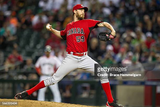 John Axford of Canada pitches against Mexico during the World Baseball Classic First Round Group D game on March 9, 2013 at Chase Field in Phoenix,...