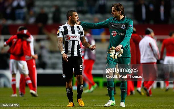 Danny Simpson and Tim Krul of Newcastle talk after the UEFA Europa League quarter final second leg match between Newcastle United and SL Benfica at...