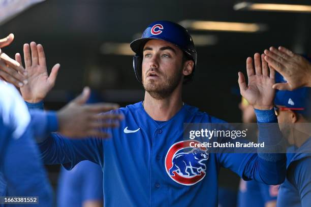 Cody Bellinger of the Chicago Cubs celebrates after scoring a third-inning run against the Colorado Rockies at Coors Field on September 13, 2023 in...