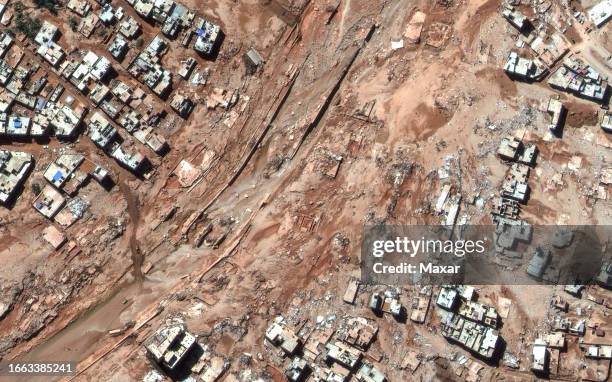 Maxar satellite imagery of streets, neighborhoods and bridges after the catastrophic flooding that struck the Libyan coastal city of Derna. Please...