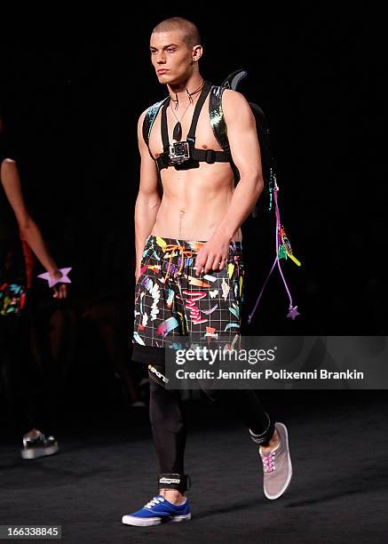 Model showcases designs on the runway at the Emma Mulholland show during Mercedes-Benz Fashion Week Australia Spring/Summer 2013/14 at Carriageworks...