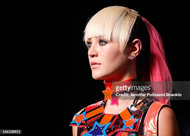 Model showcases designs on the runway at the Emma Mulholland show during Mercedes-Benz Fashion Week Australia Spring/Summer 2013/14 at Carriageworks...