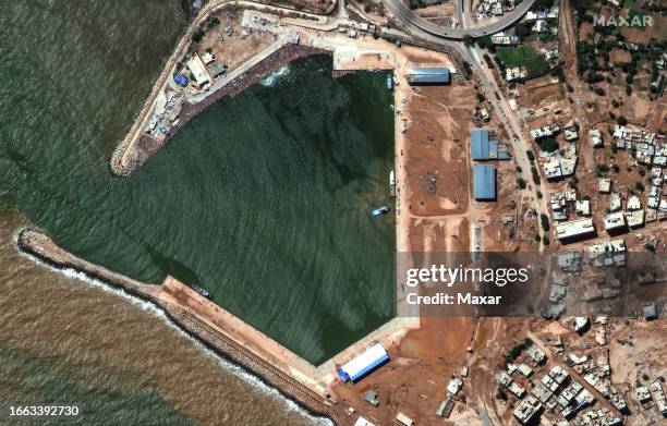 Maxar satellite imagery of the port facilities after the catastrophic flooding that struck the Libyan coastal city of Derna. Please use: Satellite...