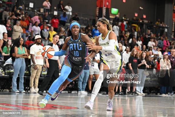 Rhyne Howard of the Atlanta Dream dribbles the ball during the game against the Dallas Wings on September 10, 2023 at Gateway Center Arena in College...