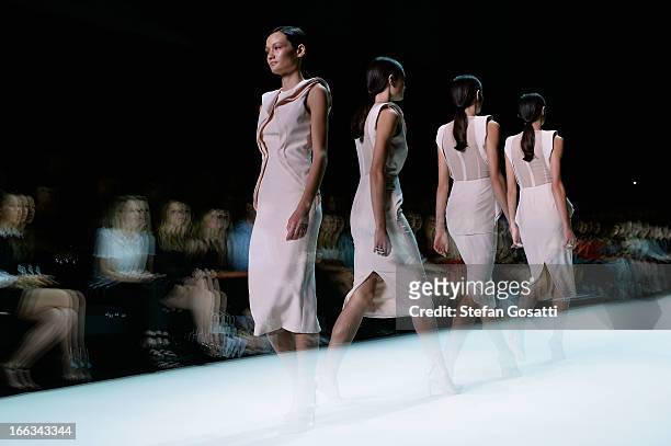 Model showcases designs by Jamie Ashkar on the runway at the New Generation show during Mercedes-Benz Fashion Week Australia Spring/Summer 2013/14 at...