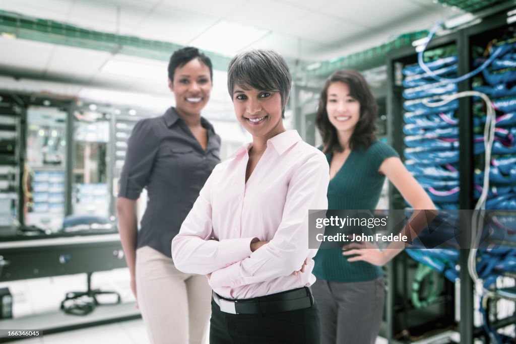 Businesswomen standing in server room