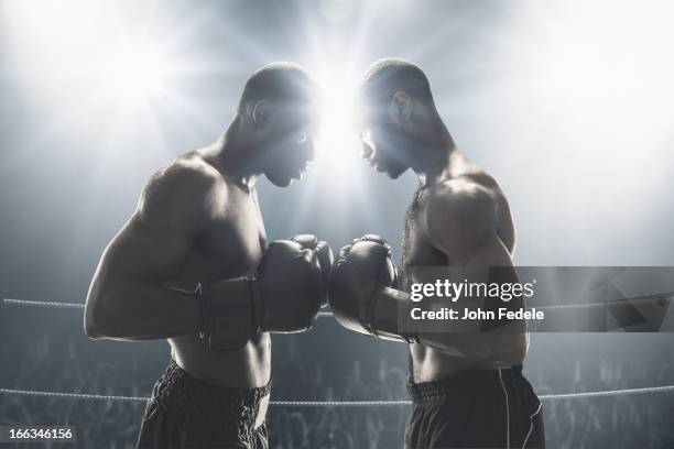 african american boxers standing in boxing ring - boxing fotografías e imágenes de stock