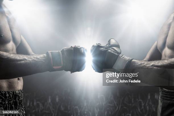 boxers touching gloves before fight - mixed martial arts 個照片及圖片檔