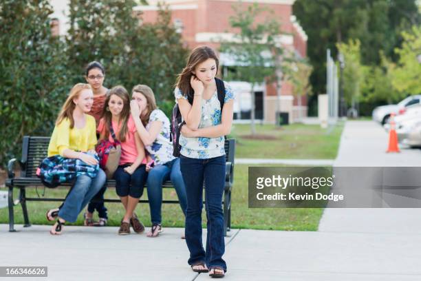 girl being teased by other girls - social exclusion stock pictures, royalty-free photos & images