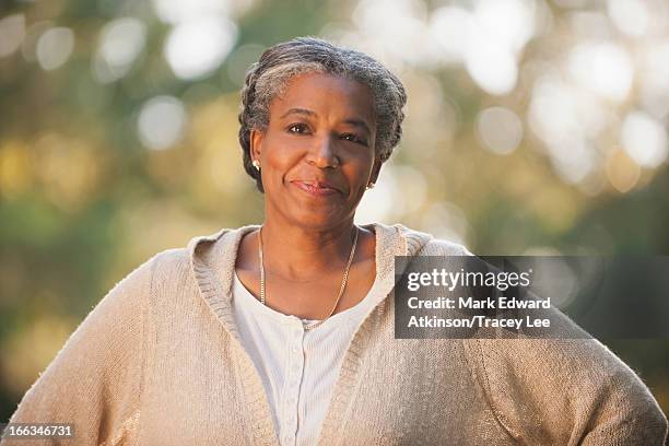 smiling mixed race woman - cherokee ethnicity stock pictures, royalty-free photos & images