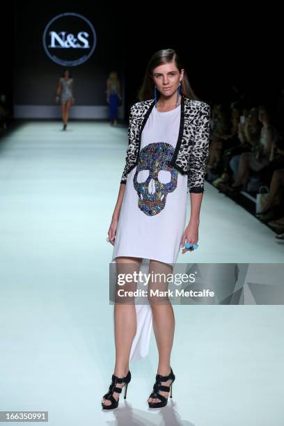 Model showcases designs by Natalie & Sarah on the runway at the New Generation show during Mercedes-Benz Fashion Week Australia Spring/Summer 2013/14...