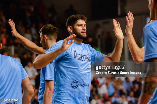 Patricio Garino of Argentina highs five his teammates during FIBA Olympic Pre-Qualifying Tournament Final match between Bahamas and Argentina on...