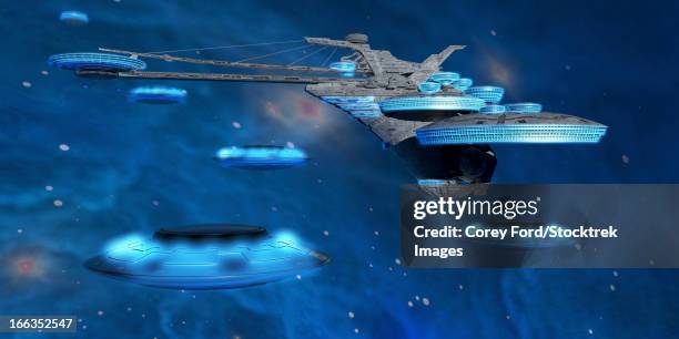 flying saucers come back to a spaceport near a blue nebula in space. - spaceport stock illustrations