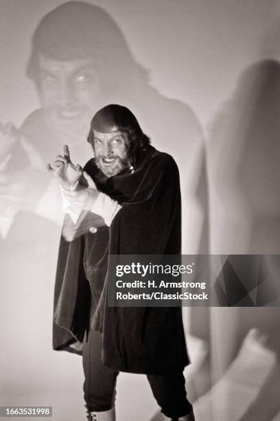 1880s Man dressed as crazed evil dr.jekyll mr. Hyde double exposure highlights the frenzied psychotic split personality.