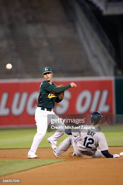 Scott Sizemore of the Oakland Athletics fields during the game against the Seattle Mariners at O.co Coliseum on April 3, 2013 in Oakland, California....