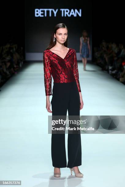 Model showcases designs by Betty Tran on the runway at the New Generation show during Mercedes-Benz Fashion Week Australia Spring/Summer 2013/14 at...