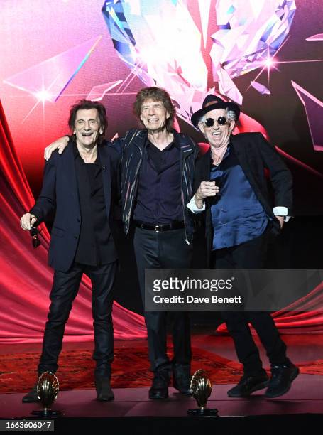 Ronnie Wood, Sir Mick Jagger and Keith Richards attend the launch event for The Rolling Stones' new album "Hackney Diamonds" at the Hackney Empire on...