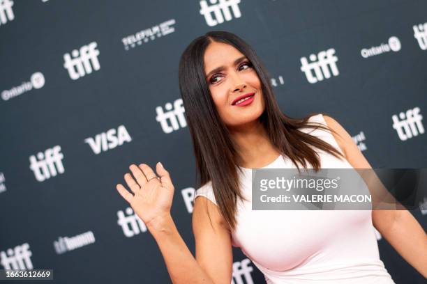 Mexican-US producer Salma Hayek Pinault arrives for the premiere of "El Sabor de la Navidad" during the Toronto International Film Festival at the...
