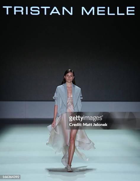 Model showcases designs by Tristan Melle on the runway at the New Generation show during Mercedes-Benz Fashion Week Australia Spring/Summer 2013/14...
