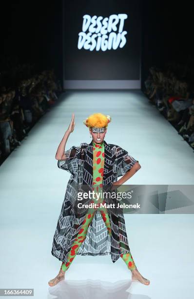 Model showcases designs by Desert Designs on the runway at the New Generation show during Mercedes-Benz Fashion Week Australia Spring/Summer 2013/14...
