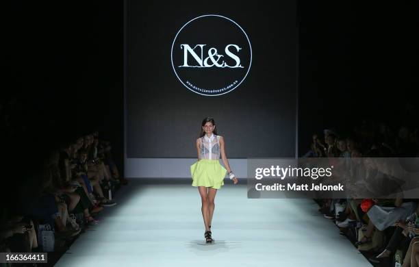 Model showcases designs by Natalie & Sarah on the runway at the New Generation show during Mercedes-Benz Fashion Week Australia Spring/Summer 2013/14...