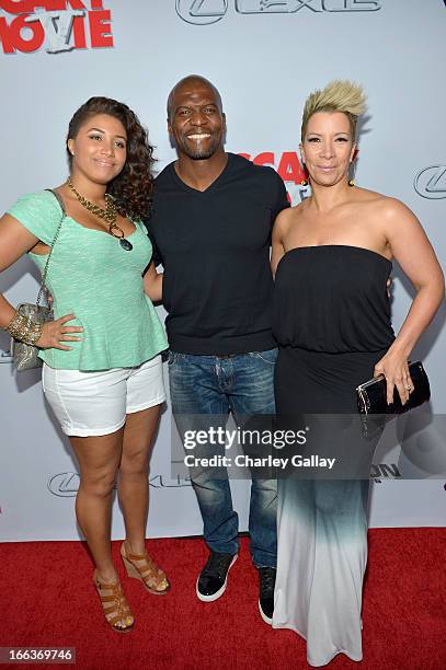 Azriel Crews, actor Terry Crews and tv personality Rebecca King-Crews arrive at the premiere of "Scary Movie V" presented by Dimension Films, in...