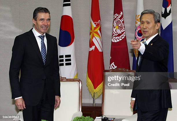 Anders Fogh Rasmussen , the NATO Secretary General, speaks with South Korean Defense Minister Kim Kwan-Jin at the defense ministry on April 12, 2013...