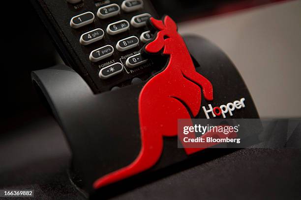 Remote control with the Dish Network Corp. Hopper logo is displayed at Pepcom DigitalFocus in New York, U.S., on Thursday, April 11, 2013....