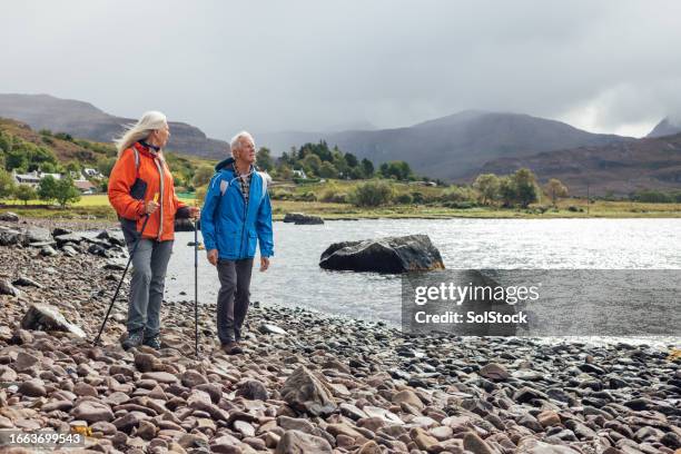 walks by the loch - hiking stock pictures, royalty-free photos & images