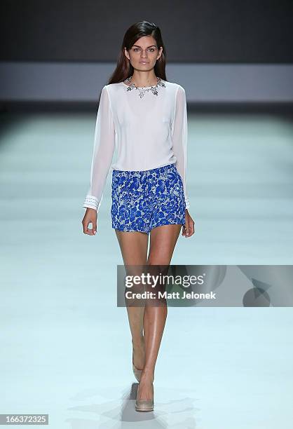 Model showcases designs by Betty Tran on the runway at the New Generation show during Mercedes-Benz Fashion Week Australia Spring/Summer 2013/14 at...