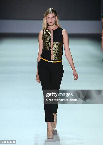 Model showcases designs by Betty Tran on the runway at the New Generation show during Mercedes-Benz Fashion Week Australia Spring/Summer 2013/14 at...